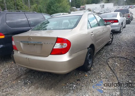 2003 Toyota Camry Le z USA, uszkodzony, nr VIN 4T1BE32K73U667912